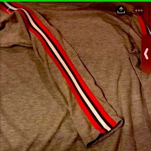Gray long sleeve with red black and white